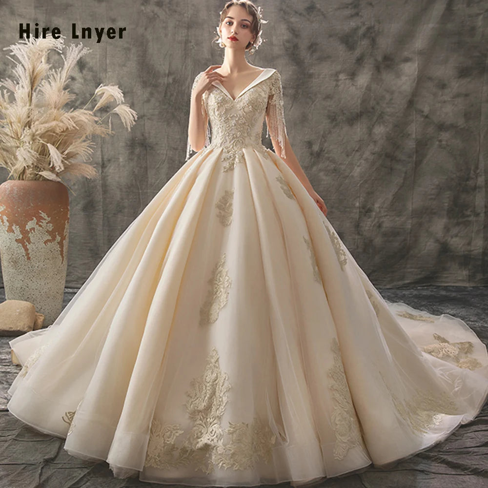 V-Neck Lace Up Beading Sequins Gold Appliques Ball Gown Wedding Dress