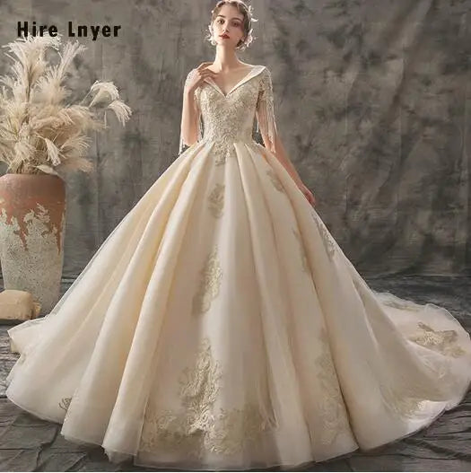 V-Neck Lace Up Beading Sequins Gold Appliques Ball Gown Wedding Dress